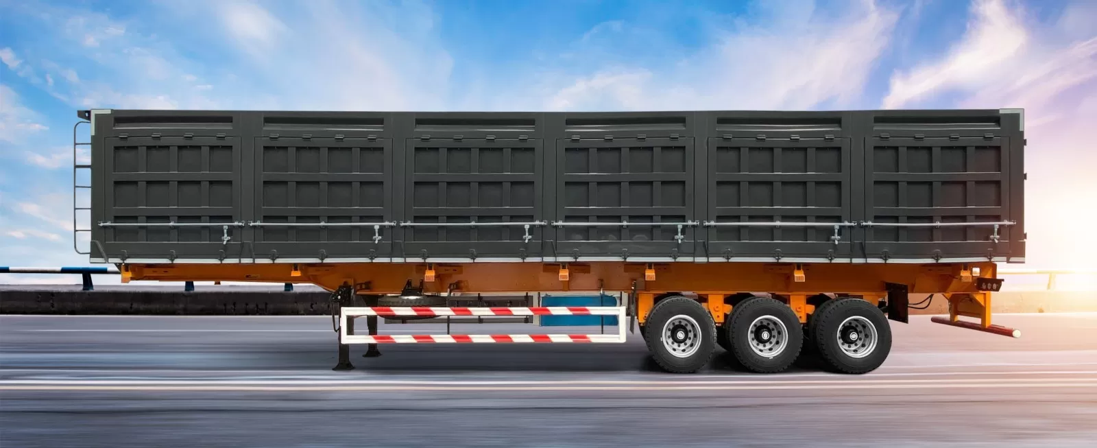 Side dump semi-trailer